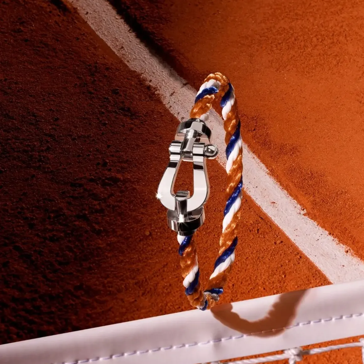 Roland-Garros Bracelets|Bracelets|FRED Force 10 buckle for - Large model 18K white and one mandarin garnet